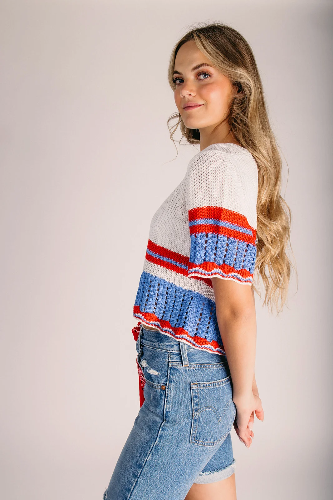 The Amara Contrast Stripe Sweater in Blue + Red - Image 6