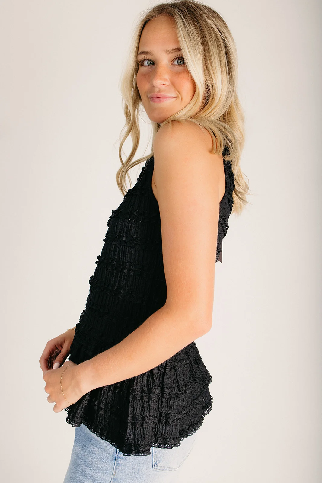 The Arlington Flutter Detail Peplum Tank in Black - Image 3