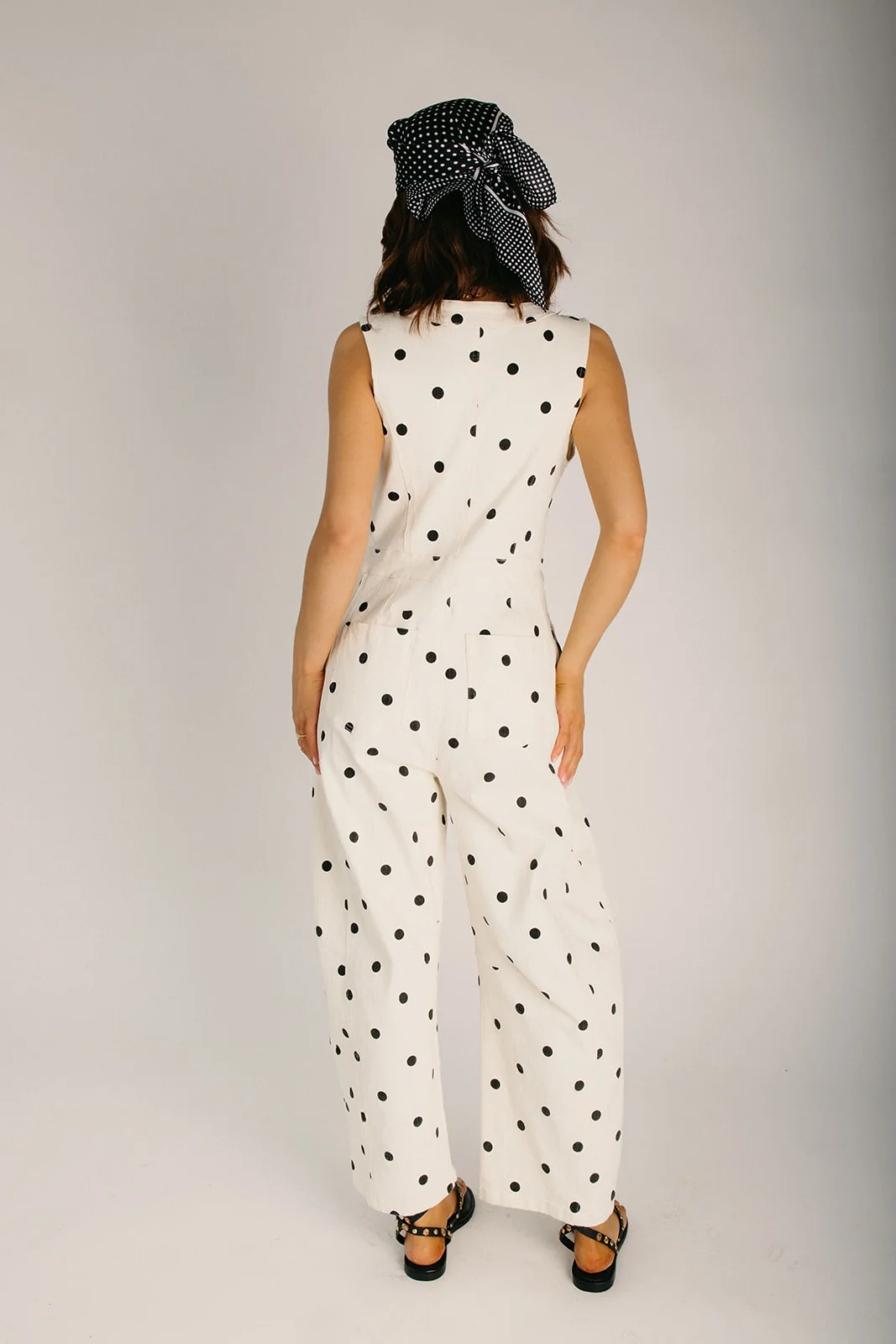 The Beltz Polka Dot Zip Up Jumpsuit in Ivory + Black - Image 2