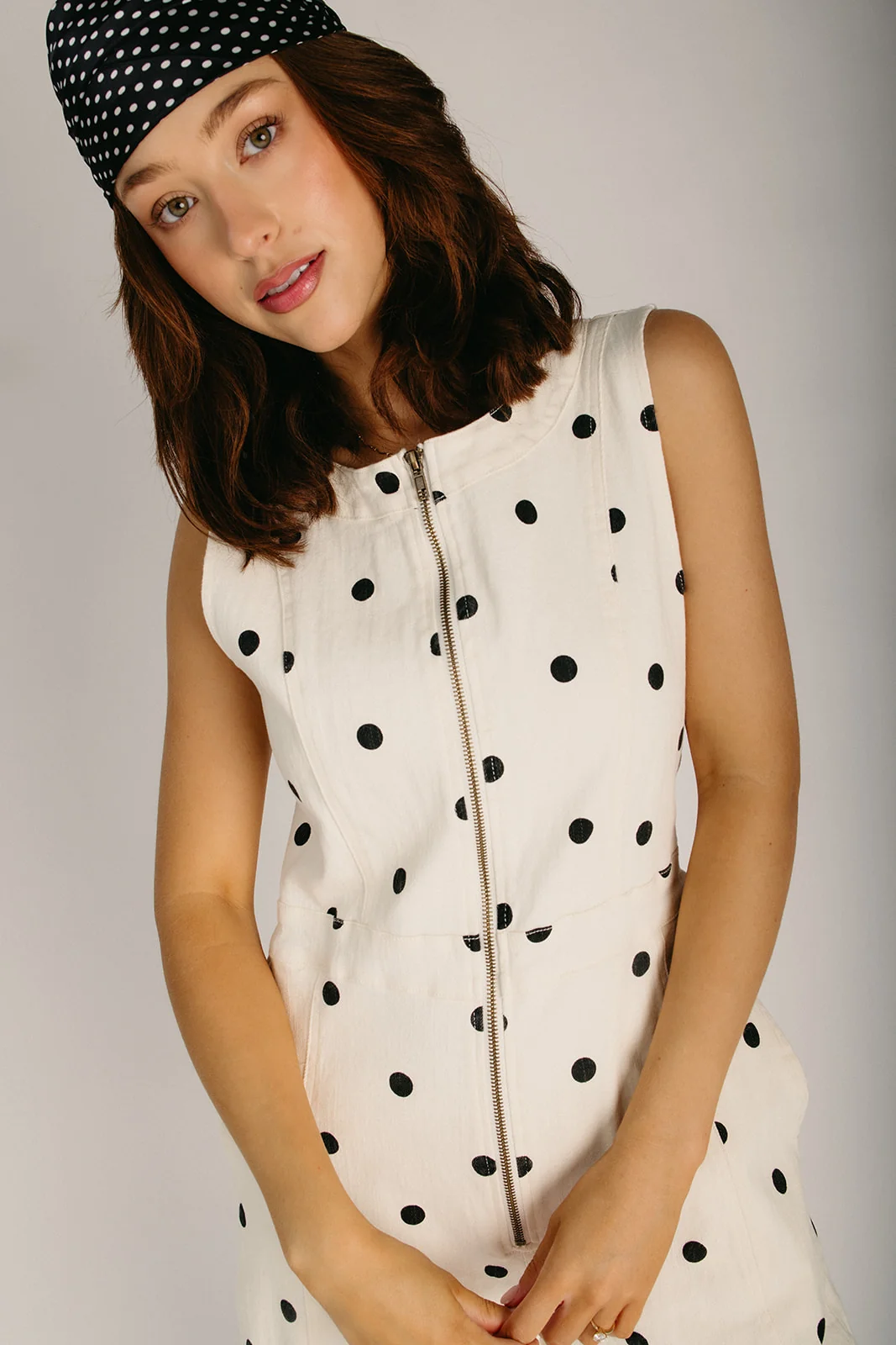The Beltz Polka Dot Zip Up Jumpsuit in Ivory + Black - Image 3