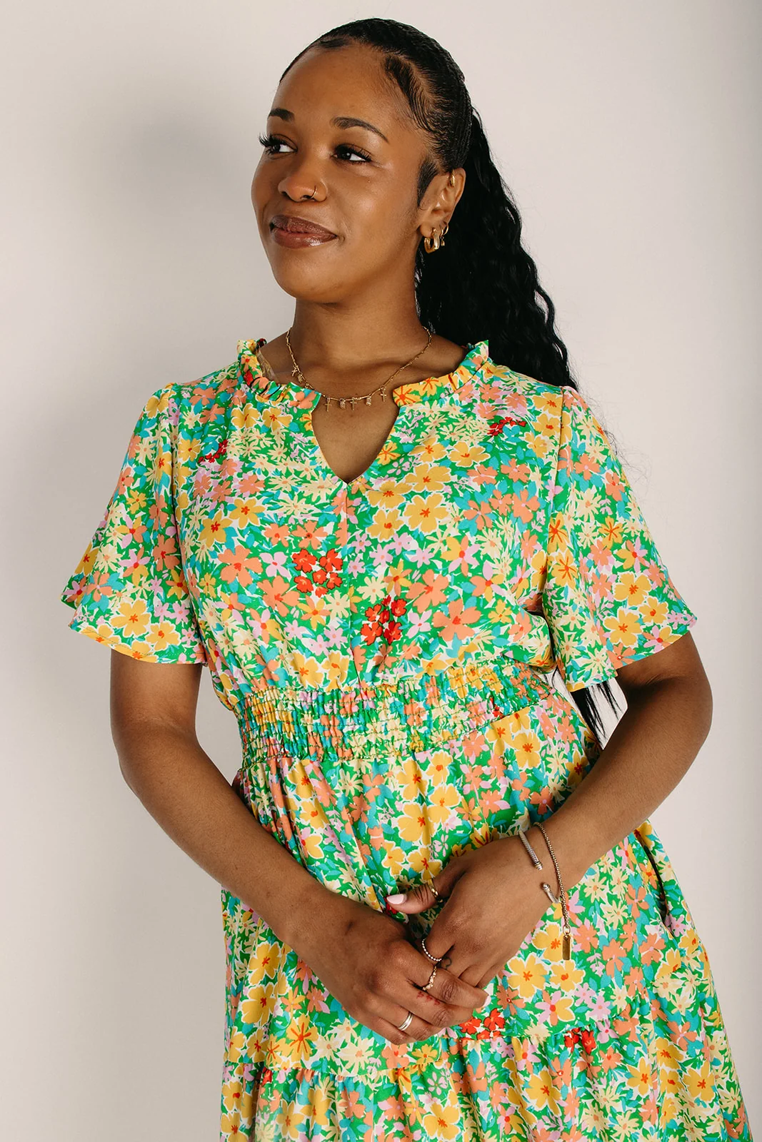 The Channa Smocked Waist Midi Dress in Green Floral - Image 3