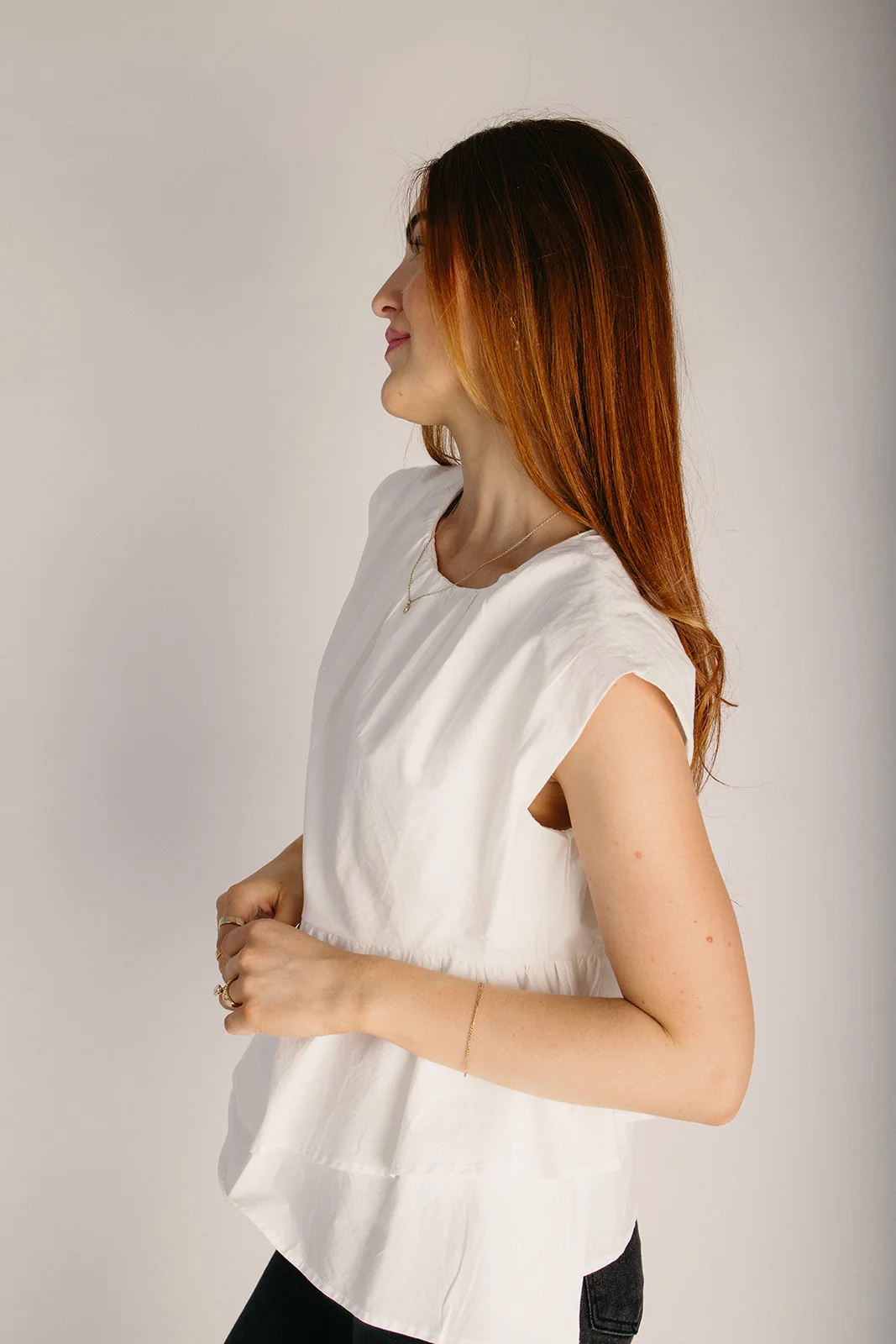 The Dallas Ruffle Hem Peplum Blouse in White - Image 4