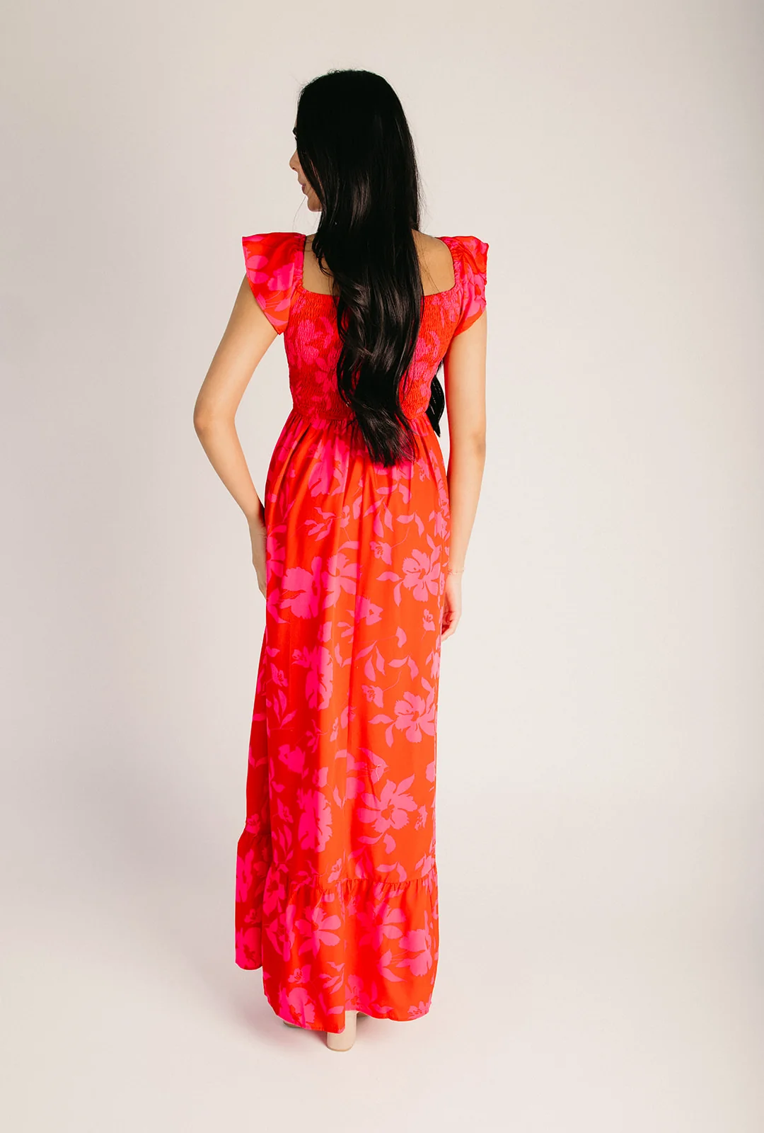 The Jocelyn Off-The-Shoulder Maxi Dress in Red Floral - Image 2