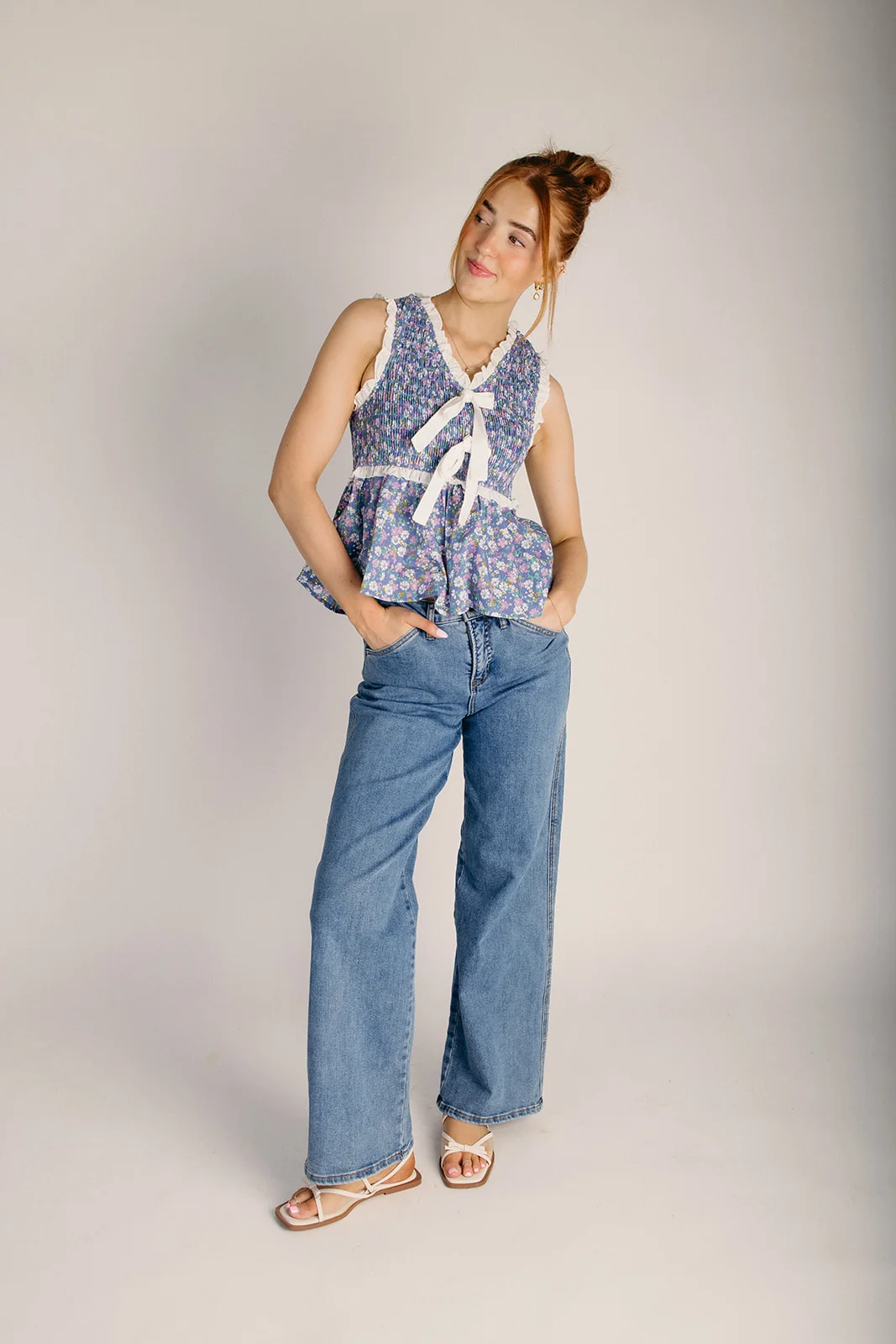 The Lowman Ditsy Floral Peplum Blouse in Cornflower Blue - Image 3