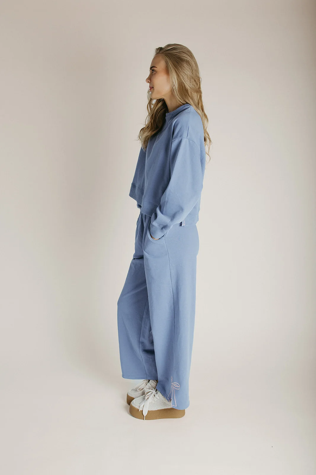 The Monzingo Bow Embroidered Pullover in Dusty Blue - Image 6