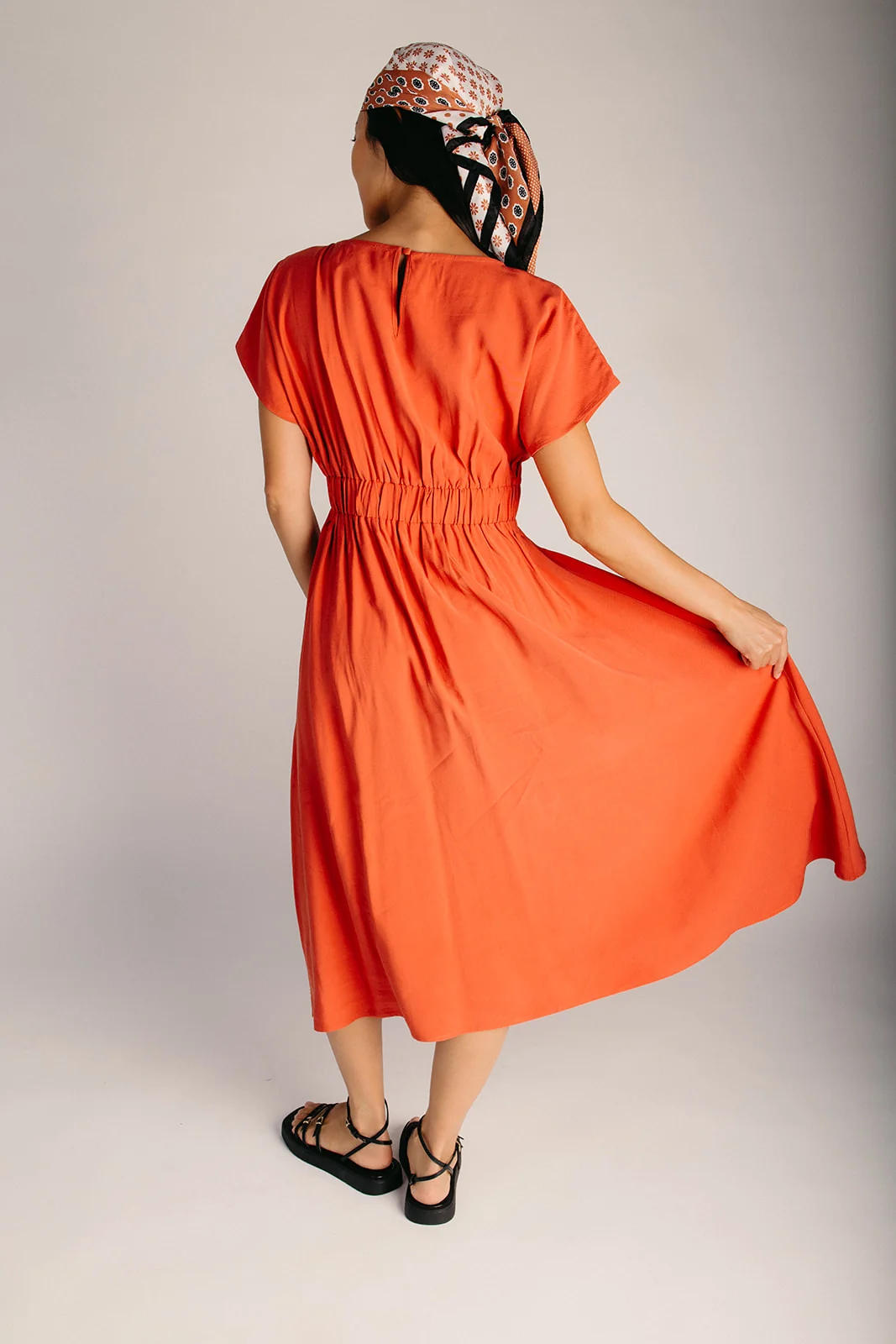 The Owen Pleated Waist Dress in Rust - Image 2