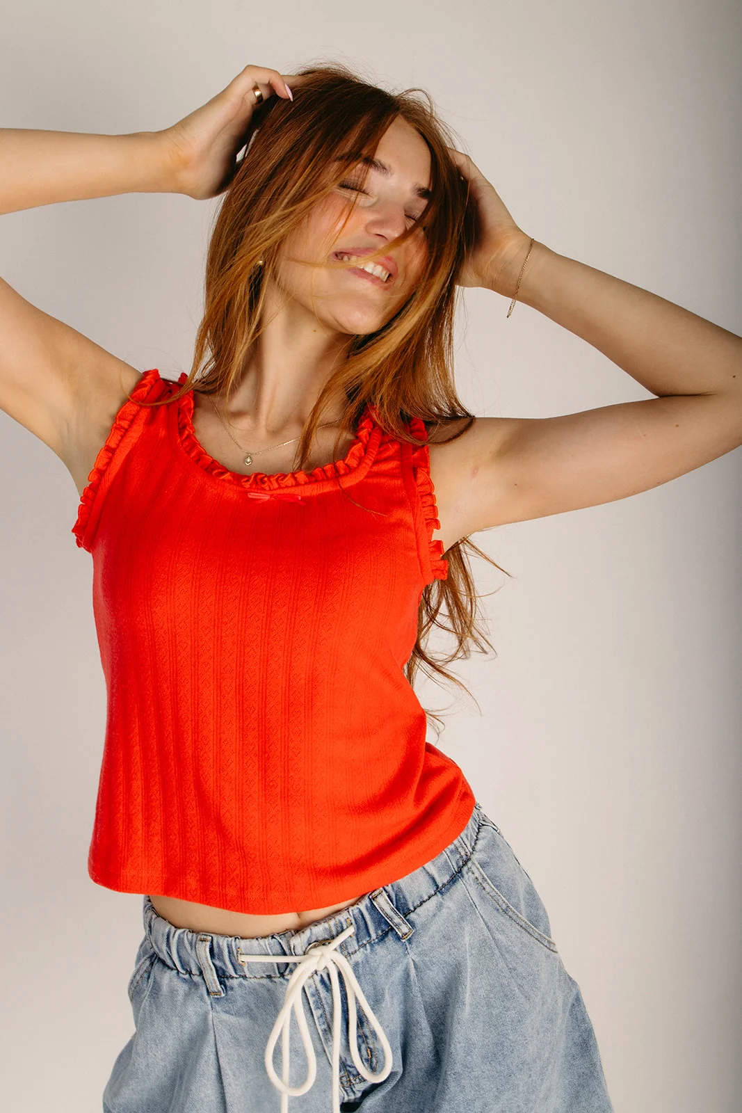 The Sharlene Ruffle Detail Tank in Papaya