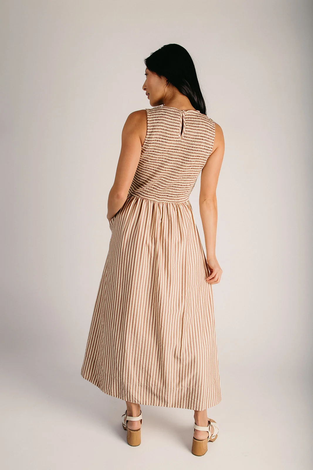 The Sopata Smocked Maxi Dress in Brown Stripe - Image 4