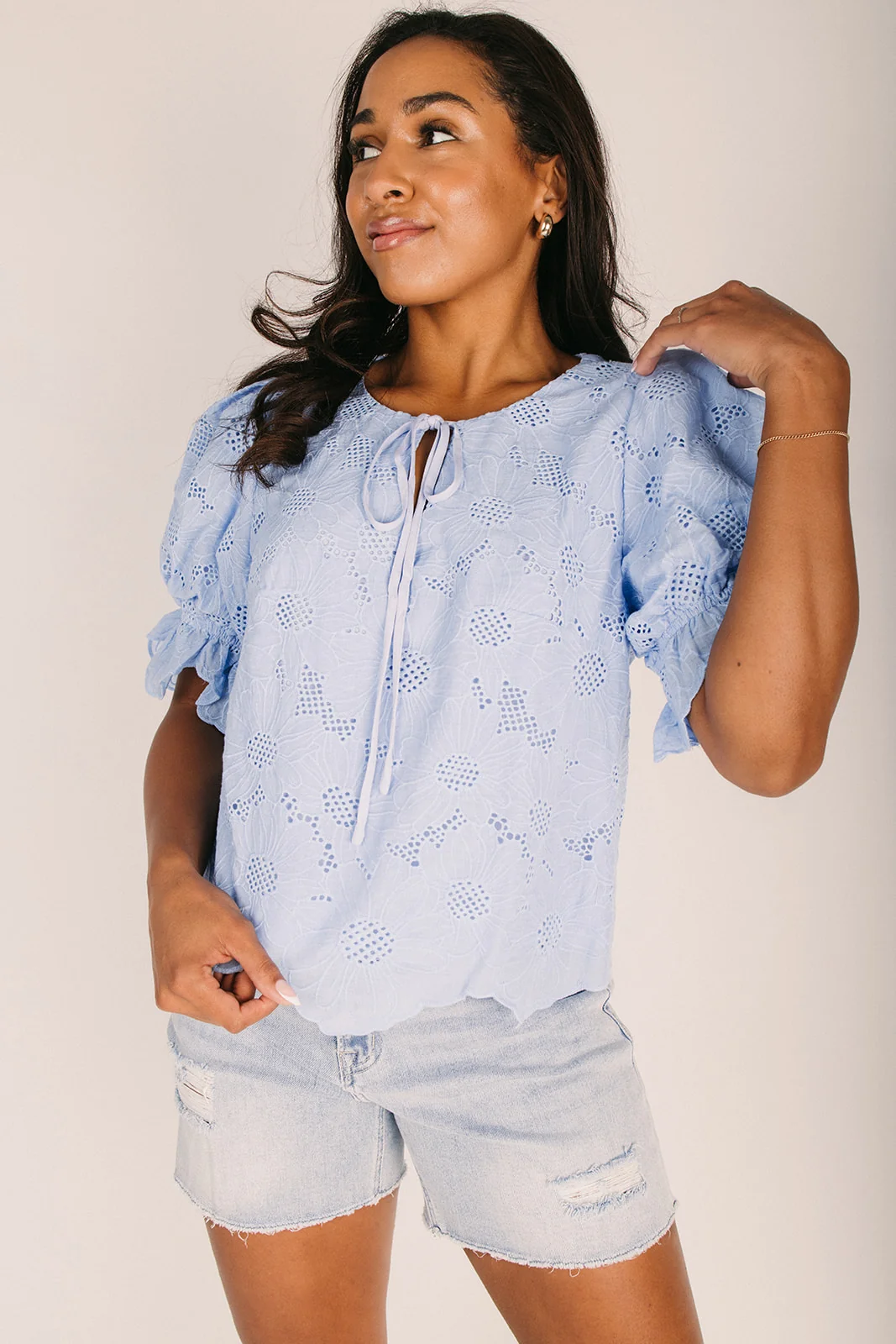 The Spinella Eyelet Detail Blouse in Blue